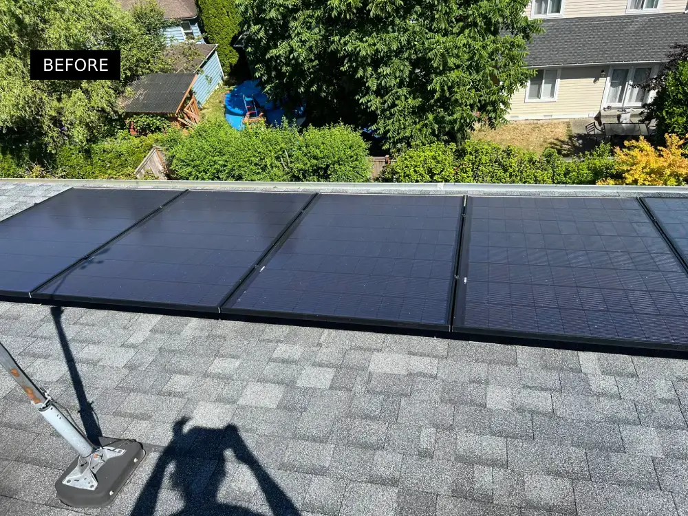 Solar panels on a residential roof covered with dust and debris, showing reduced shine before solar cleaning service.